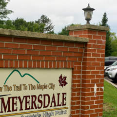 Parking lot with sign in Meyersdale