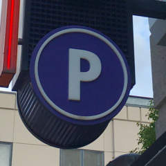 Parking sign on parking garage in South Side