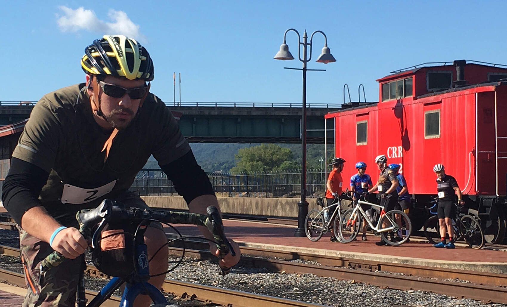 Cyclist passing Cumberland Caboose