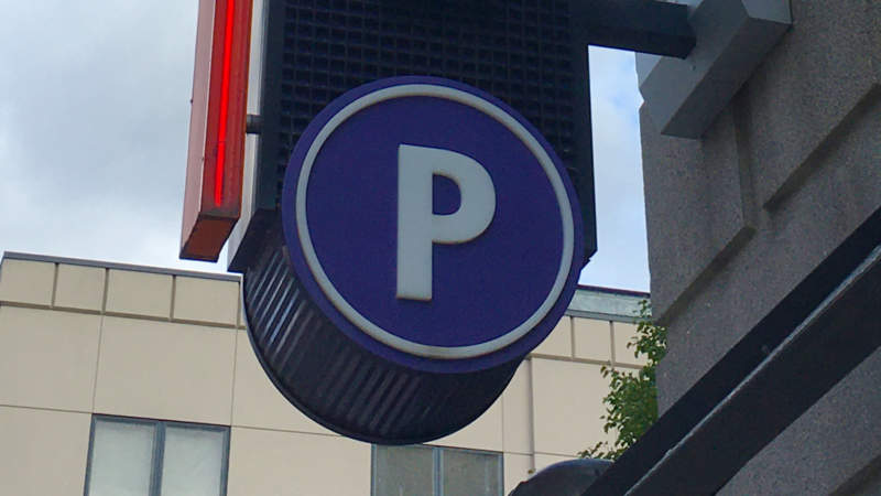 Parking sign on parking garage in South Side