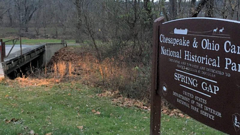 Sign for Spring Gap in front of bridge